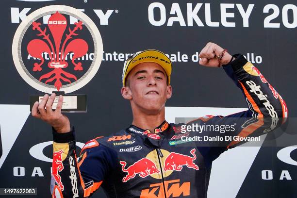 Pedro Acosta of Spain and Red Bull KTM Ajo celebrates the victory of Moto2 Race of MotoGP of Italy at Mugello Circuit on June 11, 2023 in Scarperia,...
