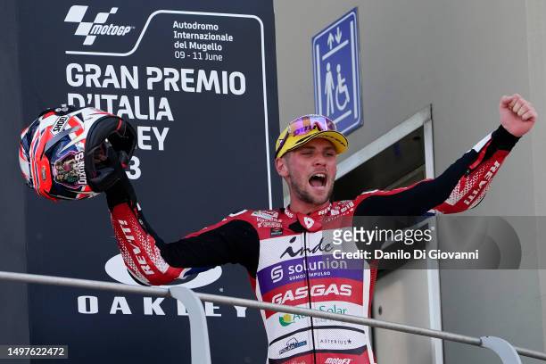 Jake Dixon of Great Britain and Inde GASGAS Aspar M2 celebrates the third place of Moto2 Race of MotoGP of Italy at Mugello Circuit on June 11, 2023...