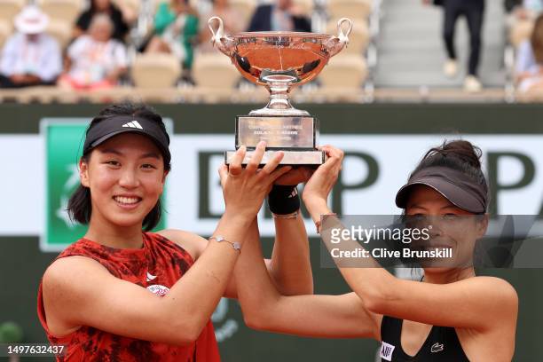 Xinyu Wang of People's Republic of China and Su-Wei Hsieh of Taipei pose with the winners trophy after victory against Leylah Fernandez of Canada and...