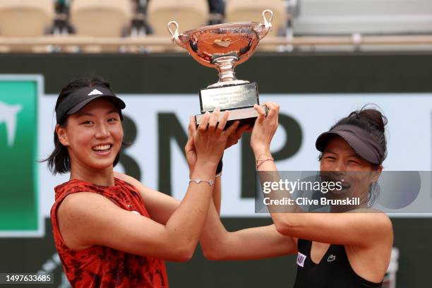 Xinyu Wang of People's Republic of China and Su-Wei Hsieh of Taipei pose with the winners trophy after victory against Leylah Fernandez of Canada and...