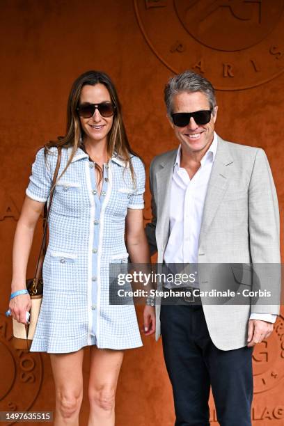 Anna Elisabet Eberstein and Hugh Grant attend the 2023 French Open at Roland Garros on June 11, 2023 in Paris, France.