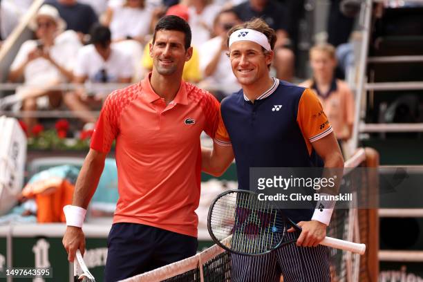 Novak Djokovic of Serbia and Casper Ruud of Norway pose for a photograph ahead of the Men's Singles Final match on Day Fifteen of the 2023 French...