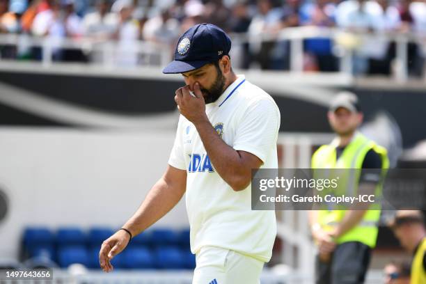 Rohit Sharma of India walks to be interviewed following defeat on day five of the ICC World Test Championship Final between Australia and India at...