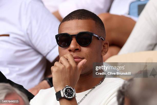 Footballer Kylian Mbappe is seen attending the Men's Singles Final match between Novak Djokovic of Serbia and Casper Ruud of Norway on Day Fifteen of...