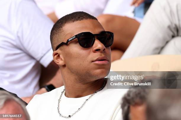 Footballer Kylian Mbappe is seen attending the Men's Singles Final match between Novak Djokovic of Serbia and Casper Ruud of Norway on Day Fifteen of...