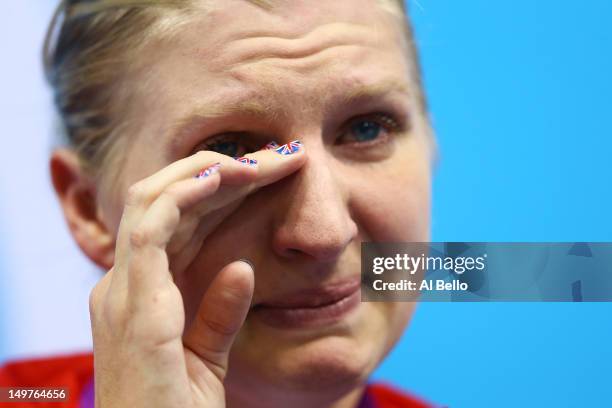 Bronze medallist Rebecca Adlington shows her emotion on the podium during the medal ceremony for the Women's 800m Freestyle on Day 7 of the London...
