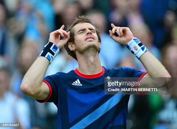 Britain's Andy Murray celebrates victory in his men's singles semifinal round match against Serbian's Novak Djokovicat in the 2012 London Olympic...