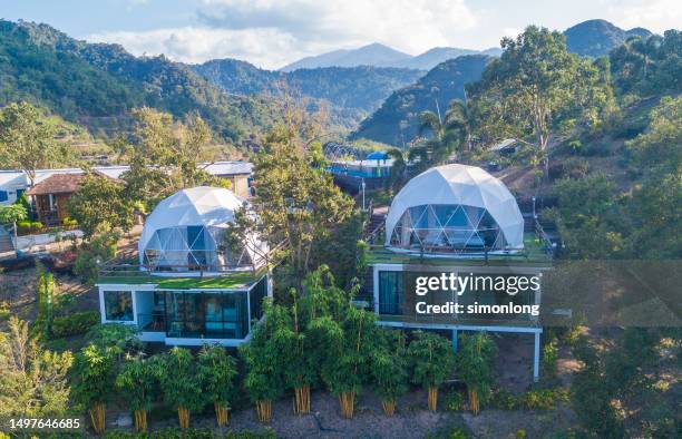 drone view of glamping dome tent in forest. luxury camping - estado de selangor fotografías e imágenes de stock