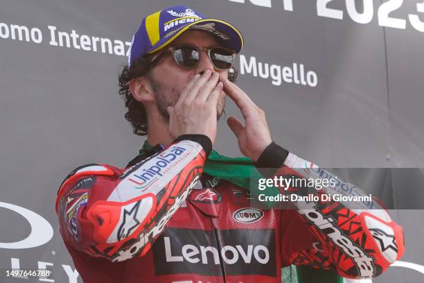 Francesco Bagnaia of Italy and Ducati Lenovo Team celebrate the victory of the Race of MotoGP of Italy at Mugello Circuit on June 11, 2023 in...