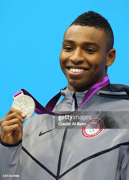 Silver medallist Cullen Jones of the United States poses on the podium during the medal ceremony for the Mens 50m Freestyle Final on Day 7 of the...
