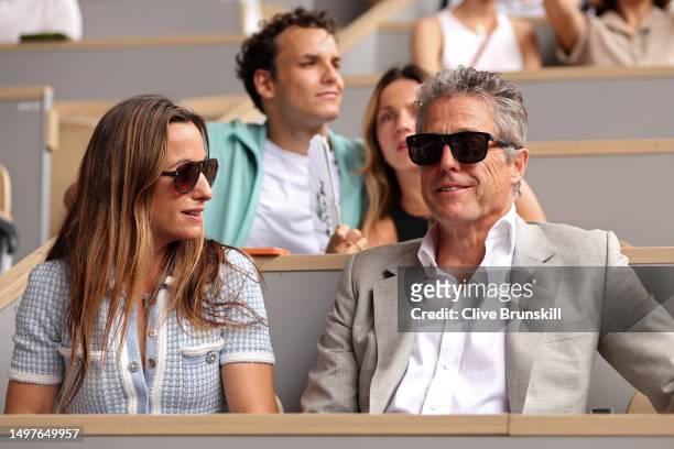 Actor Hugh Grant watches on from the crowd during the Men's Singles Final match between Novak Djokovic of Serbia and Casper Ruud of Norway on Day...