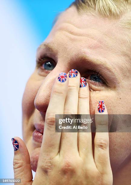 Bronze medallist Rebecca Adlington shows her emotion on the podium during the medal ceremony for the Women's 800m Freestyle on Day 7 of the London...