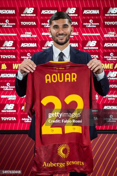 Roma new signing Houssem Aouar poses with his AS Roma jersey at Centro Sportivo Fulvio Bernardini on June 11, 2023 in Rome, Italy.