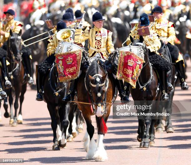 Drummer of The Mounted Band of The Household Cavalry rides, on horseback, down The Mall after taking part in Colonel's Review at Horse Guards Parade...