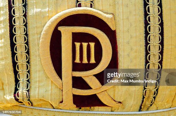 The Royal Cypher of King Charles III seen on the uniform of a member of The Mounted Band of The Household Cavalry following the Colonel's Review at...