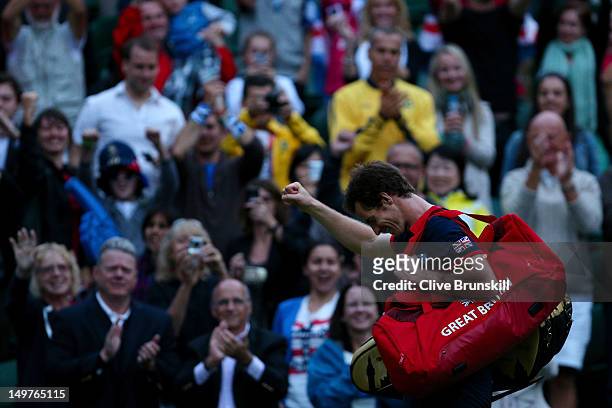 Andy Murray of Great Britain celebrates his 7-5, 7-5 win against Novak Djokovic of Serbia in the Semifinal of Men's Singles Tennis on Day 7 of the...
