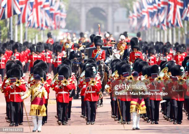 Prince William, Prince of Wales returns to Buckingham Palace, on horseback, after carrying out The Colonel's Review at Horse Guards Parade on June...