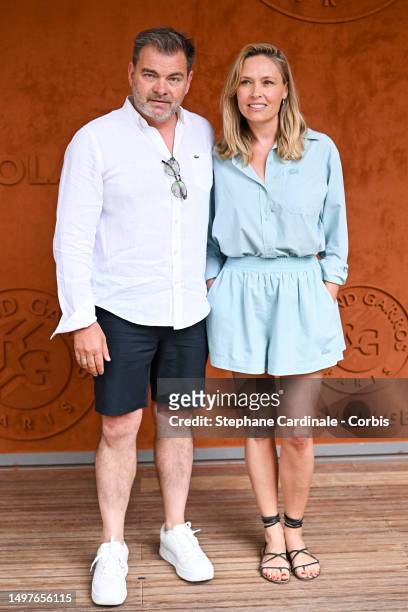 Clovis Cornillac and Lilou Fogli attend the 2023 French Open at Roland Garros on June 11, 2023 in Paris, France.