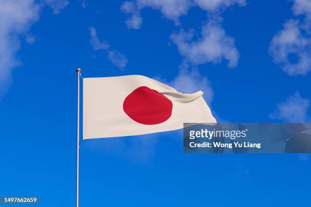 japan flag with blue sky background ,3d rendered - japan flag stock pictures, royalty-free photos & images