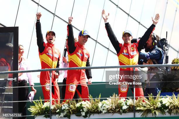 The No.51 Ferrari AF Corse Ferrari 499P team of Alessandro Pier Guidi, James Calado and Antonio Giovinazzi celebrate on the podium after winning the...