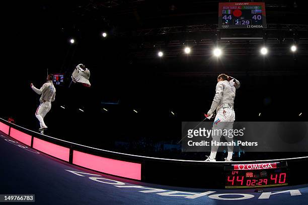 Aldo Montano of Italy competes against Alexey Yakimenko of Russia during the Men's Sabre Team Fencing on Day 7 of the London 2012 Olympic Games at...