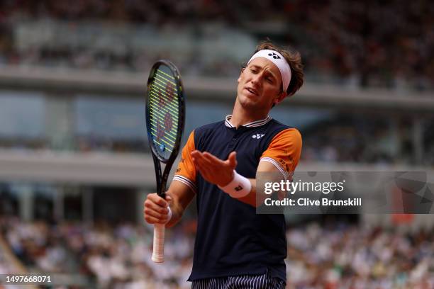 Casper Ruud of Norway reacts against Novak Djokovic of Serbia during the Men's Singles Final match on Day Fifteen of the 2023 French Open at Roland...