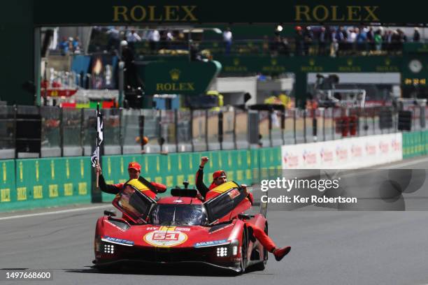 The race winning Ferrari AF Corse Ferrari 499P of Alessandro Pier Guidi , James Calado and Antonio Giovinazzi celebrate at the finish of the 100th...