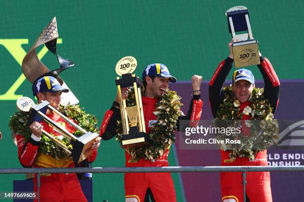 The No.51 Ferrari AF Corse Ferrari 499P team of Alessandro Pier Guidi, James Calado and Antonio Giovinazzi celebrate on the podium after winning the...