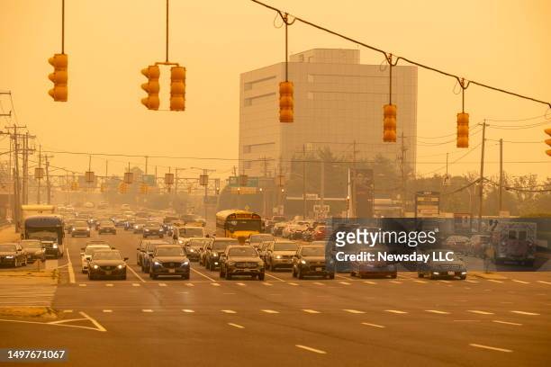 Smoke and haze moves at Old Country Rd. And Glen Cove Rd. On June 7, 2023 in Carle Place, New York as a result of wildfires in Canada.