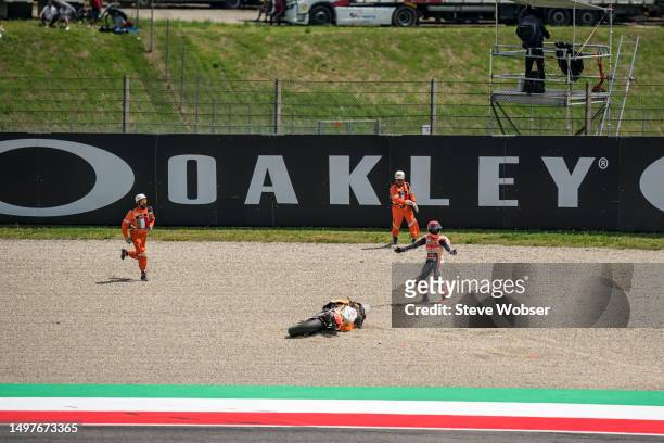 Marc Marquez of Spain and Repsol Honda Team crashes during the Race of the MotoGP Gran Premio d'Italia Oakley at Mugello Circuit on June 11, 2023 in...