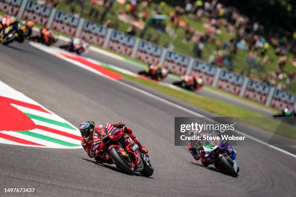 Francesco Bagnaia of Italy and Ducati Lenovo Team leads the race during the Race of the MotoGP Gran Premio d'Italia Oakley at Mugello Circuit on June...