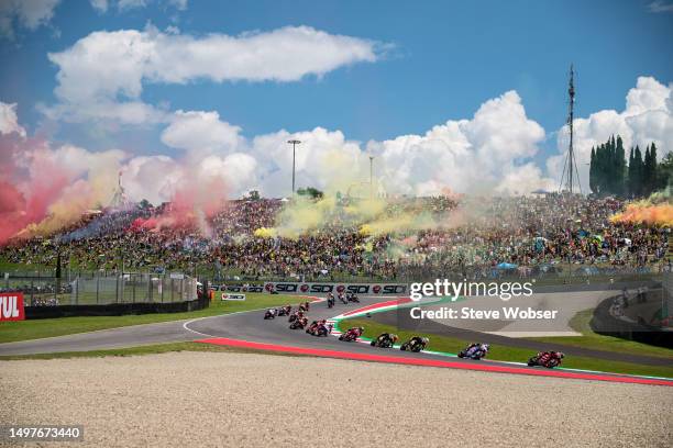 MotoGP riders on their warmup lap during the Race of the MotoGP Gran Premio d'Italia Oakley at Mugello Circuit on June 11, 2023 in Scarperia, Italy.