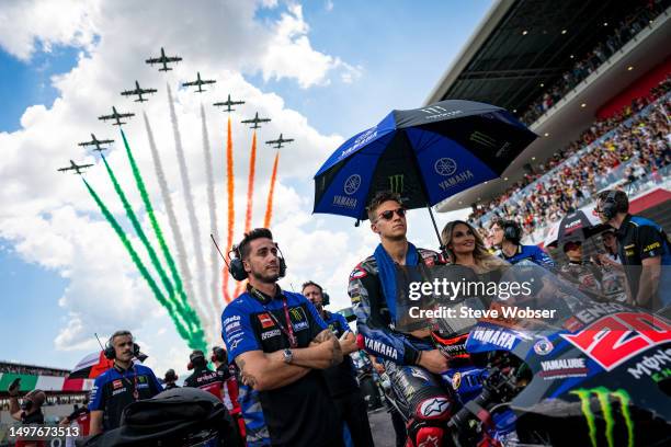 Fabio Quartararo of France and Monster Energy Yamaha MotoGP sits on his bike during the Frecce Tricolori flying over the starting grid ahead of the...