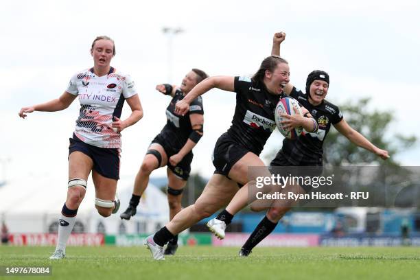 Eilidh Sinclair of Exeter Chiefs scores the team's third try during the Women's Allianz Premier 15s Semi Final match between Exeter Chiefs and...