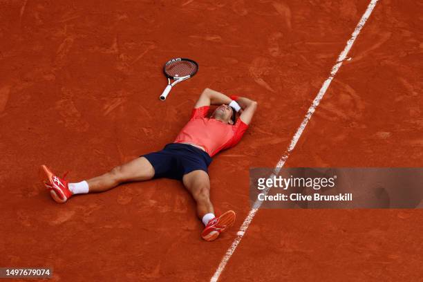 Novak Djokovic of Serbia celebrates winning match point against Casper Ruud of Norway in the Men's Singles Final match on Day Fifteen of the 2023...