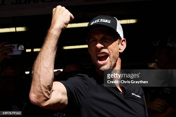 Jenson Button of the NASCAR Next Gen Chevrolet ZL1 celebrates after finishing the 100th anniversary of the 24 Hours of Le Mans at the Circuit de la...