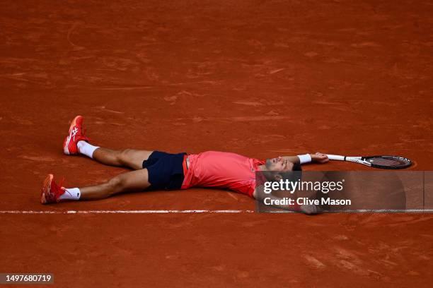 Novak Djokovic of Serbia celebrates winning match point against Casper Ruud of Norway in the Men's Singles Final match on Day Fifteen of the 2023...