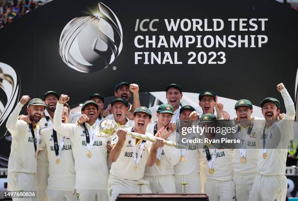 Pat Cummins of Australia lifts the ICC World Test Championship Mace during day five of the ICC World Test Championship Final between Australia and...