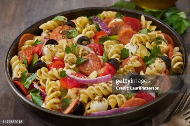 the viral pepperoni pizza pasta salad - pasta salad stock pictures, royalty-free photos & images