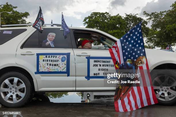 Supporters of former President Donald Trump gather at the start of the caravan to support him and wish him a Happy Birthday on June 11, 2023 in...