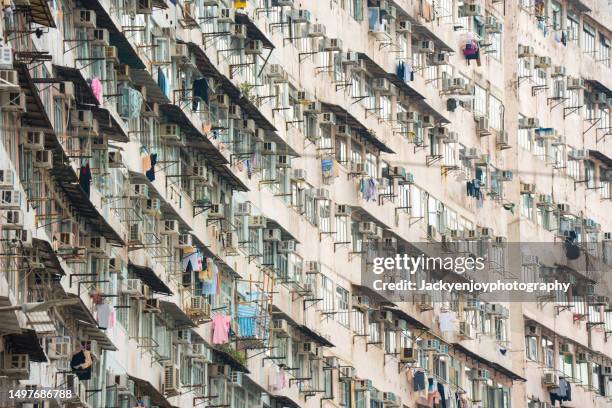 dense and highrise residential apartment blocks in hong kong city - kowloon stock-fotos und bilder