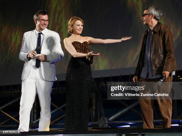 Olivier Pere, Kylie Minogue, Leos Carax attend the Swisscom Leopard of Honor To Leos Carax ceremony during the 65th Locarno Film Festival on August...