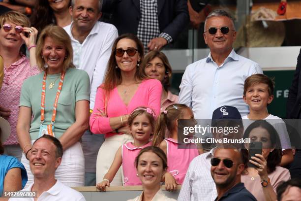 Partner of Novak Djokovic of Serbia, Jelena Djokovic and Parents Dijana Dokovic and Srdjan Djokovic reacts after Novak Djokovic of Serbia's victory...