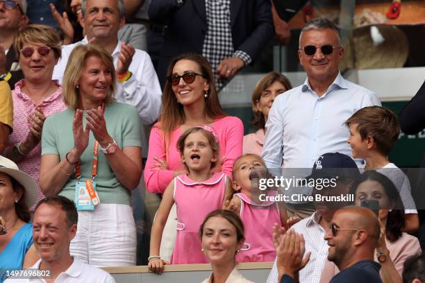 Partner of Novak Djokovic of Serbia, Jelena Djokovic and Parents Dijana Dokovic and Srdjan Djokovic reacts after Novak Djokovic of Serbia's victory...