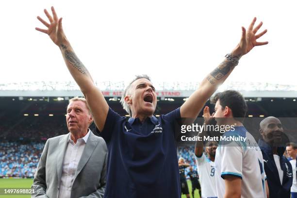 Robbie Williams reacts during Soccer Aid for Unicef 2023 at Old Trafford on June 11, 2023 in Manchester, England.