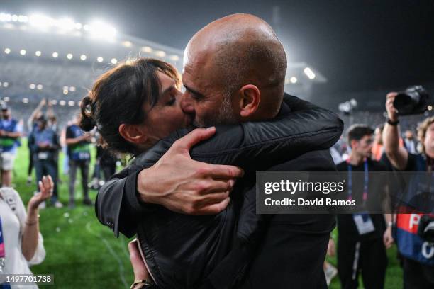 Pep Guardiola, Manager of Manchester City, celebrates with his wife Cristina Serra after the team's victory during the UEFA Champions League 2022/23...