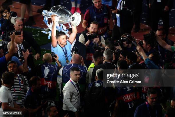 Rodri of Manchester City celebrates with the UEFA Champions League trophy after the team's victory in the UEFA Champions League 2022/23 final match...