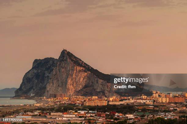 gibraltar upper rock and city of la linea de la conception (spain and gibraltar/ uk) - la linea de conception stock pictures, royalty-free photos & images