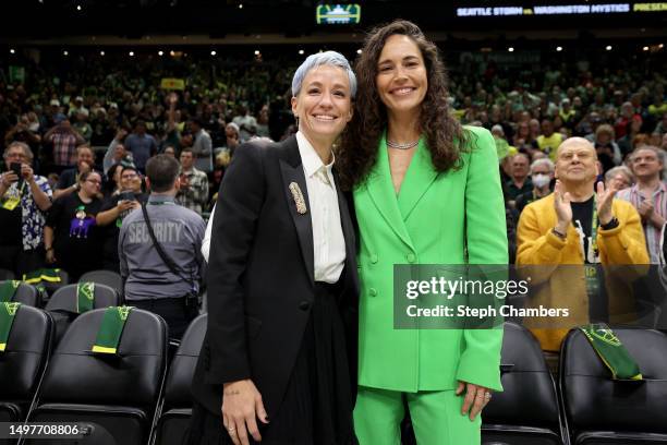 June 11: Megan Rapinoe and Sue Bird pose for a portrait before the game between the Seattle Storm and the Washington Mystics and her jersey...