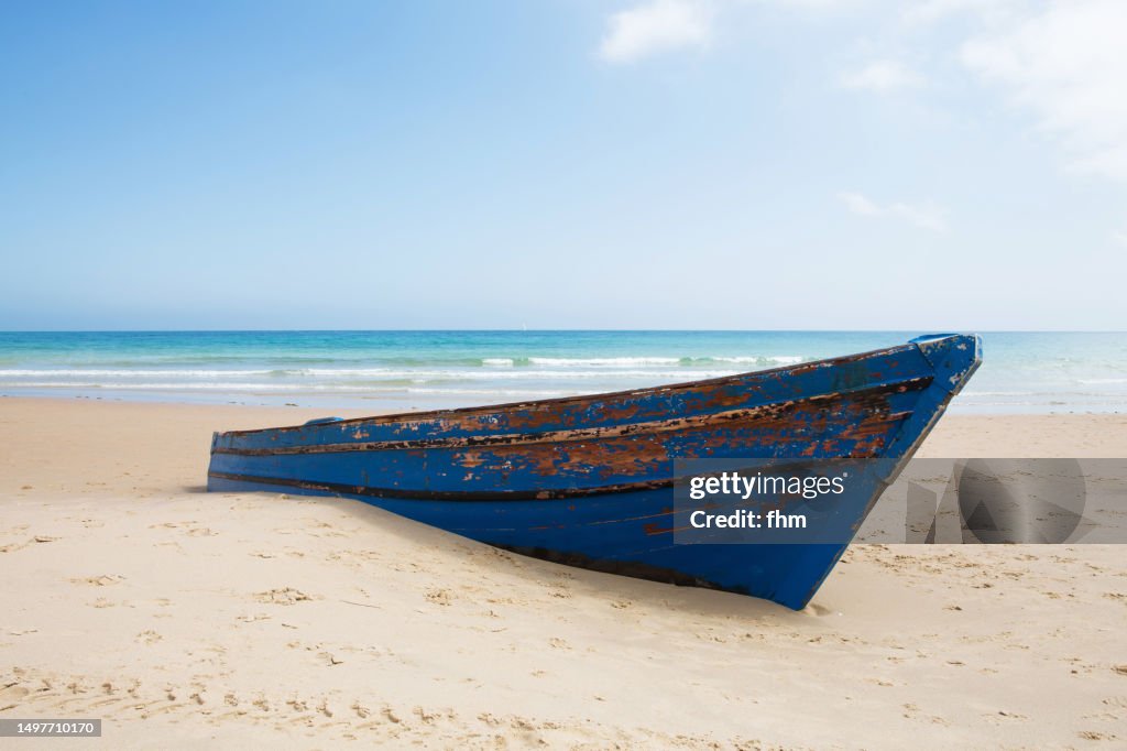 Old rowboat on the beach